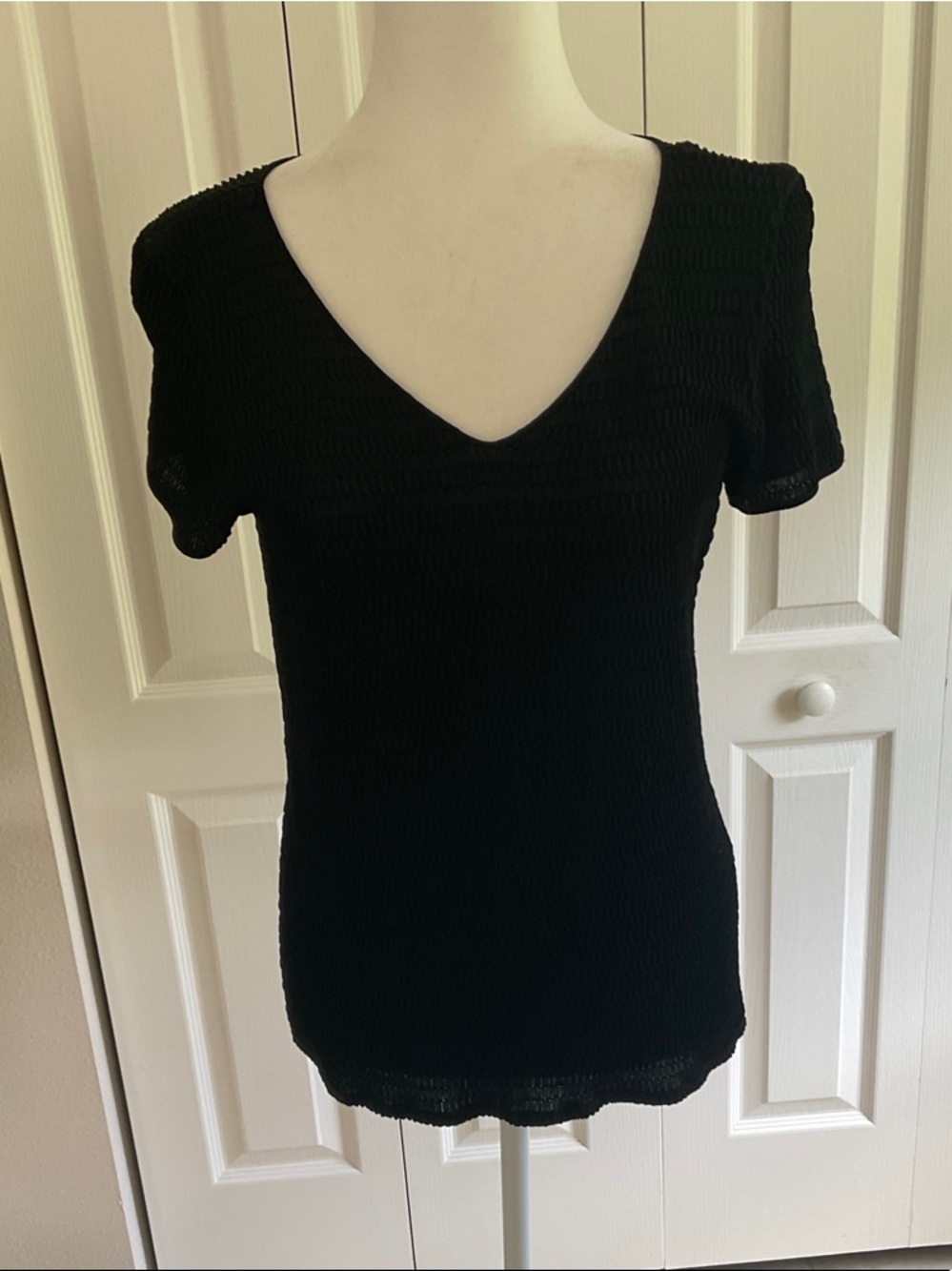 Armani Collectioni.Women's Black V-Neck Short Sleeve Knit Top